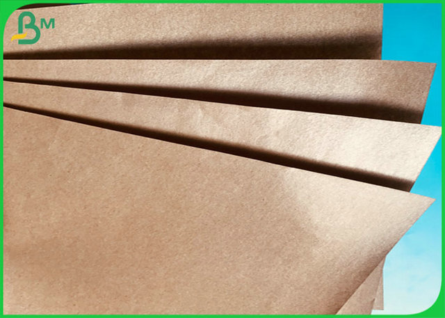 Um papel revestido brilhante lateral do acondicionamento de papel de embalagem do PE de Brown/alimentos do à prova de água