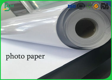 O rolo 24 polegadas 36 polegadas absorve a tinta de impressão um papel lustroso alto lateral da foto