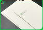 O revestimento lustroso do PE de papel LDPE 300g + 15g laminou as folhas brancas do cartão de Fbb