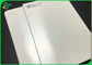 O revestimento lustroso do PE de papel LDPE 300g + 15g laminou as folhas brancas do cartão de Fbb
